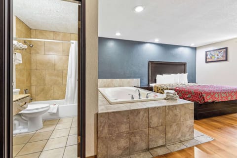 Suite, 1 King Bed, Non Smoking | In-room safe, desk, blackout drapes, rollaway beds