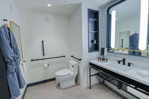 Suite, 1 King Bed, Accessible (Roll-In Shower, Mobility & Hearing) | Bathroom | Deep soaking tub, hydromassage showerhead, designer toiletries