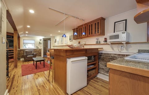 Lower level-Mini kitchen,bar table and living room
