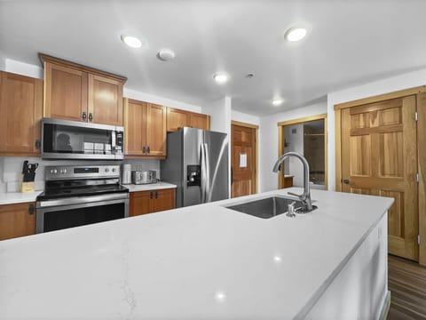 Condo, 2 Bedrooms | Private kitchen | Fridge, oven, dishwasher, coffee/tea maker