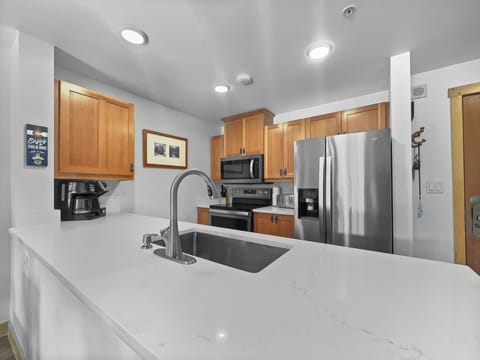 Condo, 2 Bedrooms | Private kitchen | Fridge, oven, dishwasher, coffee/tea maker