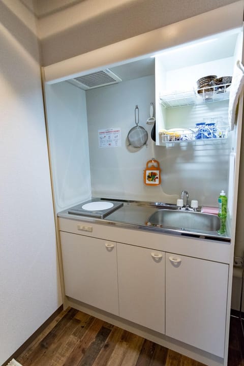 Quadruple Room, Bathtub (Q) | Private kitchenette | Fridge, microwave, stovetop, electric kettle