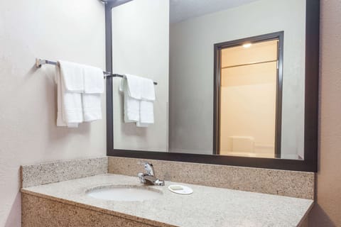 Room, 2 Queen Beds, Non Smoking | Bathroom | Combined shower/tub, hair dryer, towels, soap