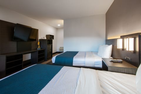 Deluxe Room, 2 Double Beds, Non Smoking, Refrigerator & Microwave | Bathroom | Shower, towels, soap, shampoo