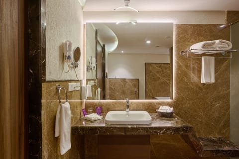 Flora Suite with complimentary airport transfers | Bathroom | Designer toiletries, hair dryer, bathrobes, slippers