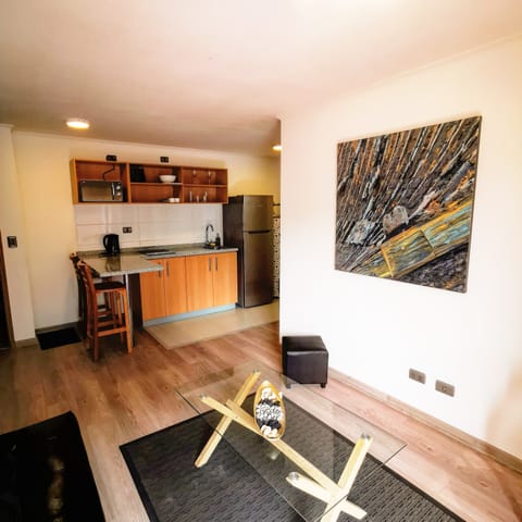 Twin Room (Departamento 1 Habitacion 2 camas) | Living area | 43-inch flat-screen TV with cable channels, TV