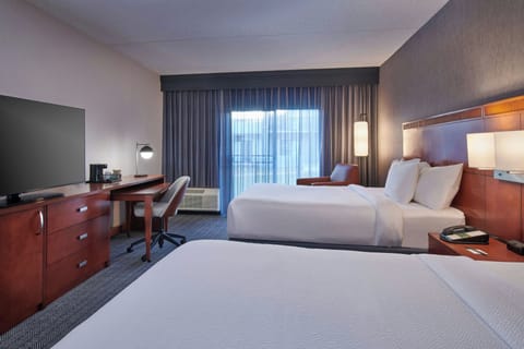 Desk, laptop workspace, blackout drapes, iron/ironing board