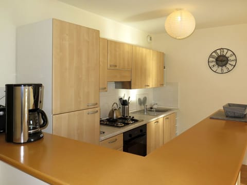 Countertop, Room, Property, Interior Design, Furniture, Cabinetry, Kitchen, Floor, Building, Yellow