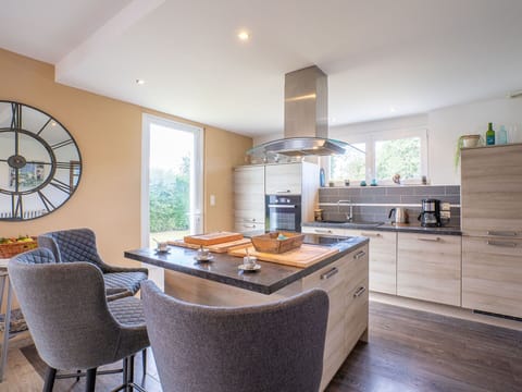 Cabinetry, Furniture, Countertop, Table, Chair, Kitchen, Wood, Interior Design, Window, Kitchen Appliance