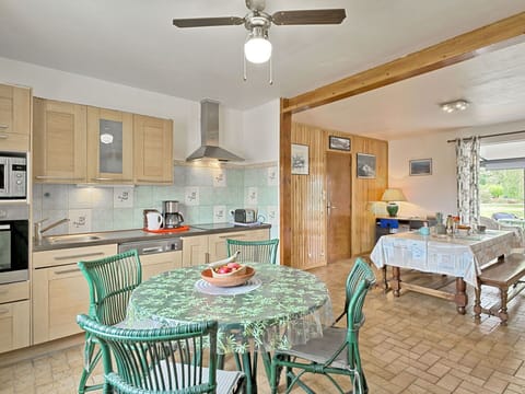 Table, Furniture, Property, Cabinetry, Ceiling Fan, Chair, Countertop, Lighting, Home Appliance, Wood