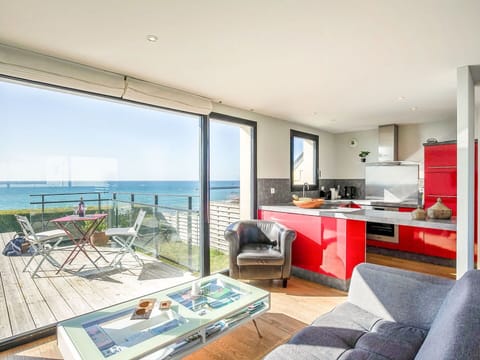 Furniture, Building, Table, Plant, Chair, Houseplant, Shade, Orange, Interior Design, Flooring