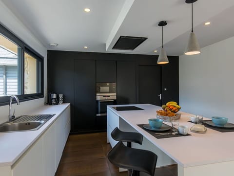 Kitchen Sink, Cabinetry, Sink, Countertop, Tap, Table, Kitchen, Lighting, Window, Wood