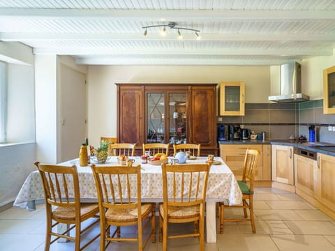 Table, Furniture, Property, Chair, Cabinetry, Countertop, Wood, Lighting, Interior Design, Floor