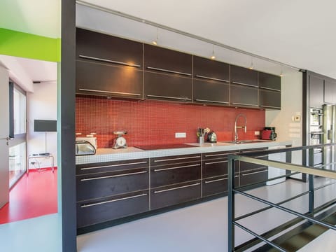 Interior Design, Flooring, Kitchen, Ceiling, Cabinetry, Floor, Lighting, Furniture, Countertop, Cupboard