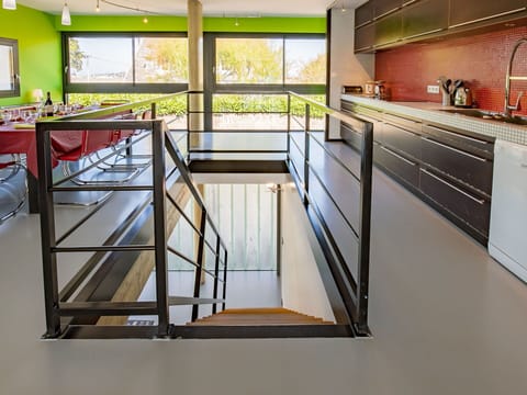 Flooring, Interior Design, Floor, Ceiling, Kitchen, Glass, Wood Flooring, Hardwood, Chair, Wood Stain