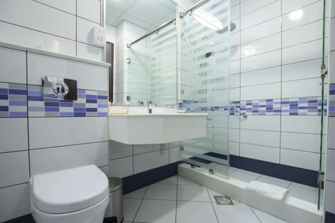 Shower, free toiletries, hair dryer, slippers