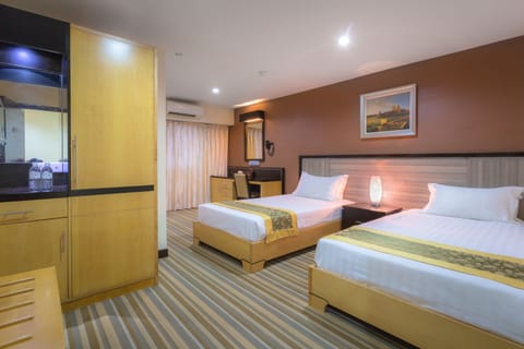 Deluxe Twin Room, 2 Twin Beds | Down comforters, minibar, in-room safe, individually decorated