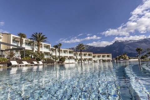 Indoor pool, seasonal outdoor pool, pool umbrellas, sun loungers