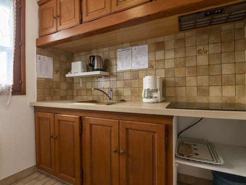 Cabinetry, Property, Countertop, Furniture, Building, Kitchen Appliance, Tap, Kitchen, Wood, Interior Design
