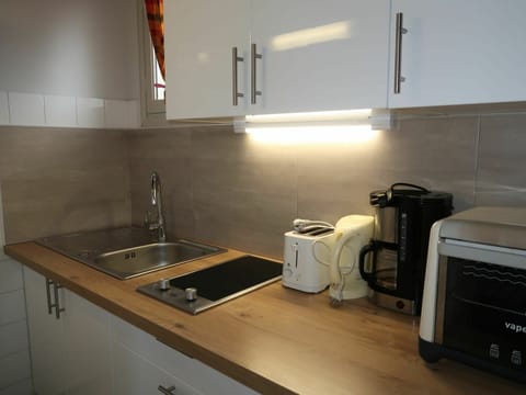 Countertop, Room, Property, Sink, Kitchen, Major Appliance, Tile, Kitchen Appliance, Floor, Cabinetry