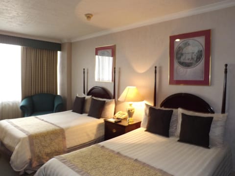 Desk, blackout drapes, free cribs/infant beds, rollaway beds