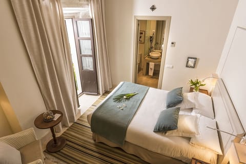Deluxe Room, 1 Queen Bed, Terrace | Egyptian cotton sheets, down comforters, memory foam beds, minibar