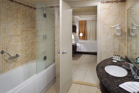 Executive Suite, 1 King Bed, Ocean View | Bathroom | Bathtub, eco-friendly toiletries, hair dryer, bathrobes