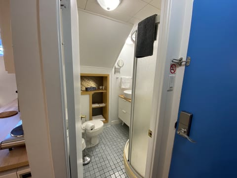 Basic Apartment | Bathroom | Free toiletries, hair dryer, towels, soap