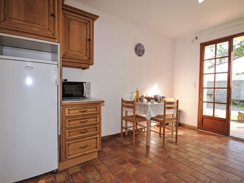 Furniture, Flooring, Wood, Interior Design, Cabinetry, Floor, Room, Ceiling, Countertop, Cupboard