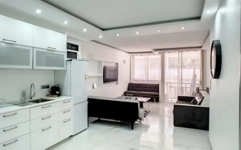 Comfort Apartment | Living area | 55-inch flat-screen TV with cable channels, TV, Netflix