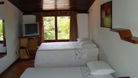 Standard Triple Room | Pillowtop beds, minibar, iron/ironing board, free WiFi