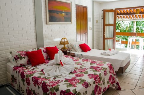 Standard Quadruple Room | Pillowtop beds, minibar, iron/ironing board, free WiFi