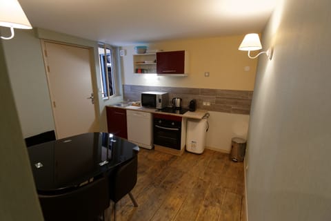 Apartment | Private kitchenette | Fridge, microwave, oven, stovetop