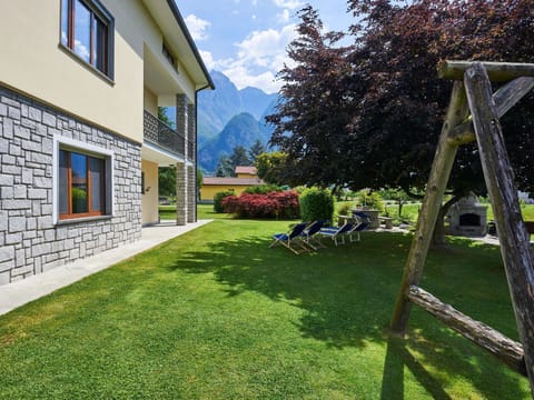 Sky, Plant, Property, Window, Building, Cloud, Tree, Shade, Grass, Cottage