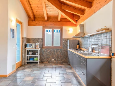 Cabinetry, Countertop, Furniture, Shelf, Wood, Shelving, Interior Design, Flooring, Floor, Kitchen Stove