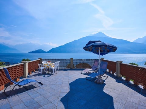 Water, Sky, Cloud, Furniture, Blue, Mountain, Seaside Resort, Azure, Chair, Outdoor Furniture