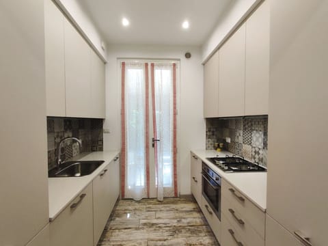 Cabinetry, Countertop, Property, Sink, Tap, Kitchen Sink, Wood, Kitchen, Interior Design, Flooring