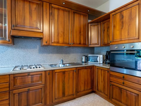 Brown, Cabinetry, Countertop, Kitchen Sink, Kitchen, Sink, Wood, Building, Kitchen Appliance, Interior Design