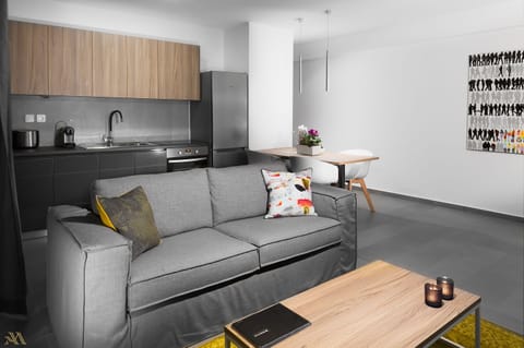 Apartment, 1 Bedroom, City View (001) | Living area | Flat-screen TV