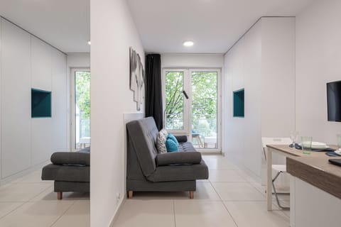 Classic Studio, 1 Bedroom | Living area | Flat-screen TV