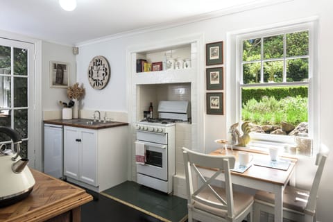 Gatehouse Cottage | Private kitchen | Full-size fridge, microwave, stovetop, coffee/tea maker