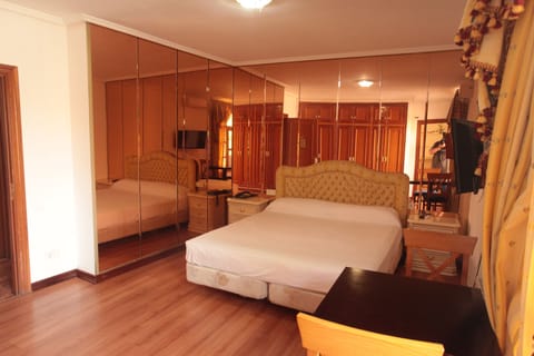 Luxury Double Room, Hot Tub | Premium bedding, laptop workspace, blackout drapes, iron/ironing board