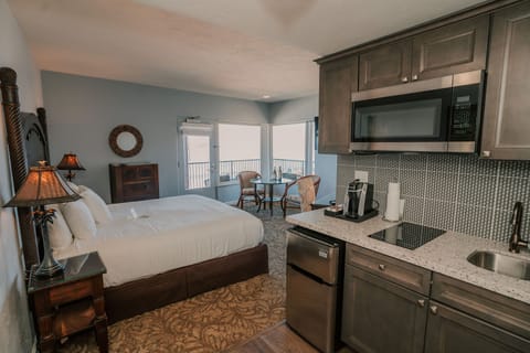 Deluxe Room, 1 King Bed, Ocean View | Private kitchen | Fridge, microwave, stovetop, coffee/tea maker