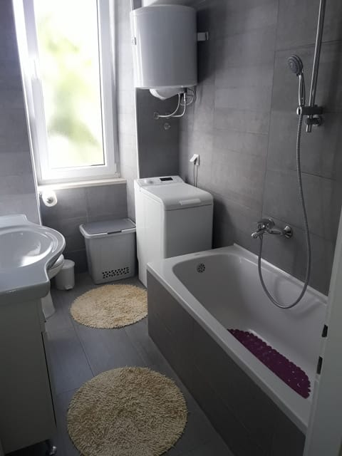 Standard Apartment, 2 Bedrooms | Bathroom | Bathtub, deep soaking tub, hair dryer, bathrobes