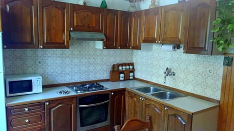 Basic Apartment, 2 Bedrooms | Private kitchen | Full-size fridge, stovetop, coffee/tea maker, electric kettle