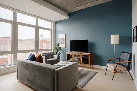 Deluxe Apartment, 2 Bedrooms, Balcony | Living area | Flat-screen TV
