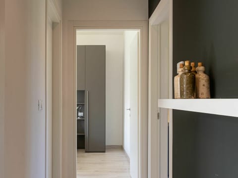 Wood, Flooring, Floor, Door, Hardwood, Building, Beige, Ceiling, Hall