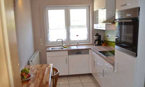 Apartment | Private kitchen | Microwave, stovetop, coffee/tea maker, highchair