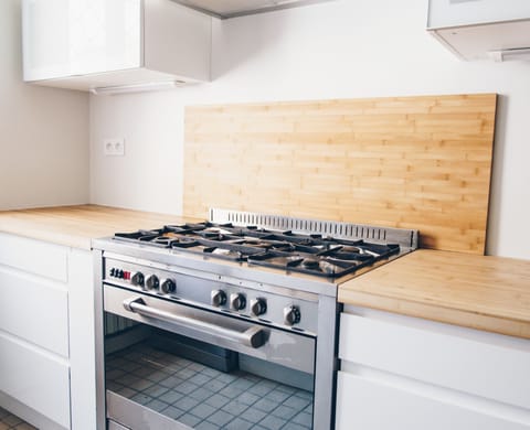 Fully-equipped kitchen with a gas stove