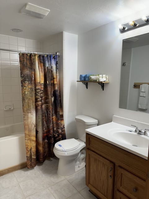 Rosewood Cottage #10 | Bathroom | Free toiletries, hair dryer, towels, soap